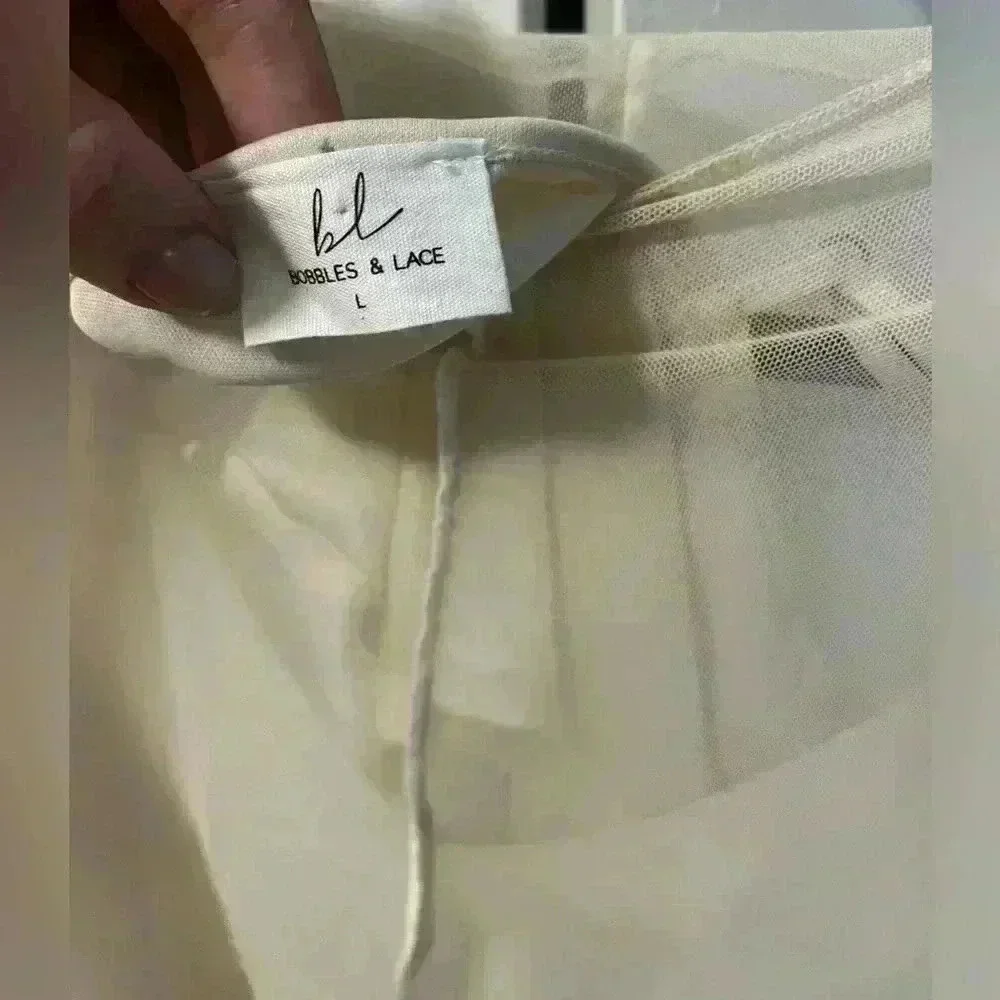 Sheer ivory top with built in tank top